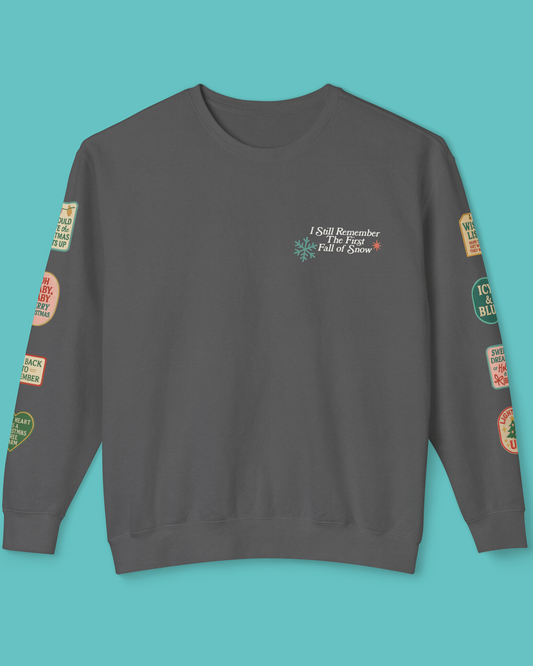 Pepper Gray Comfort Colors Sweatshirt with ski patches on the sleeves