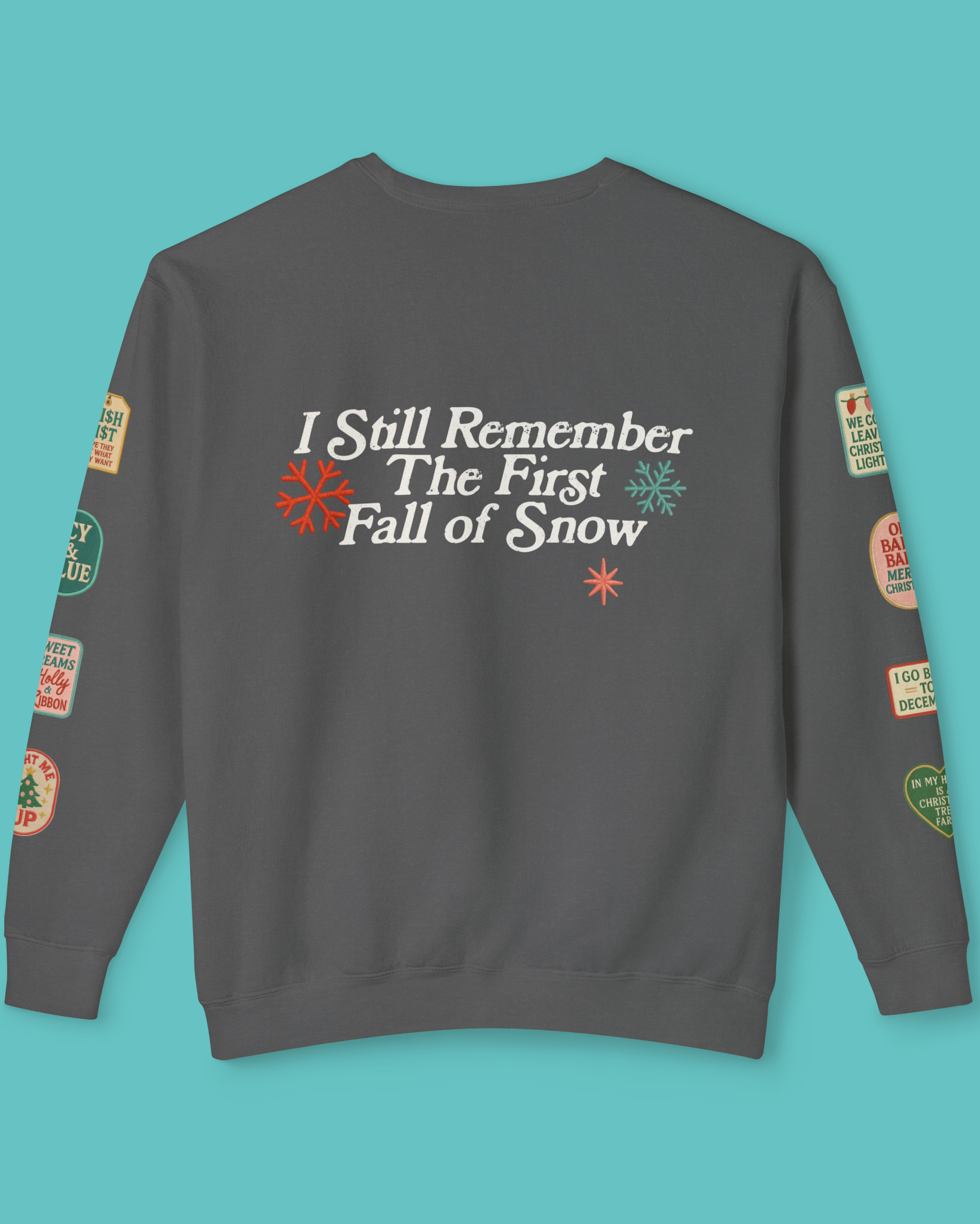 Back of Pepper Gray Comfort Colors Sweatshirt with ski patches on the sleeves