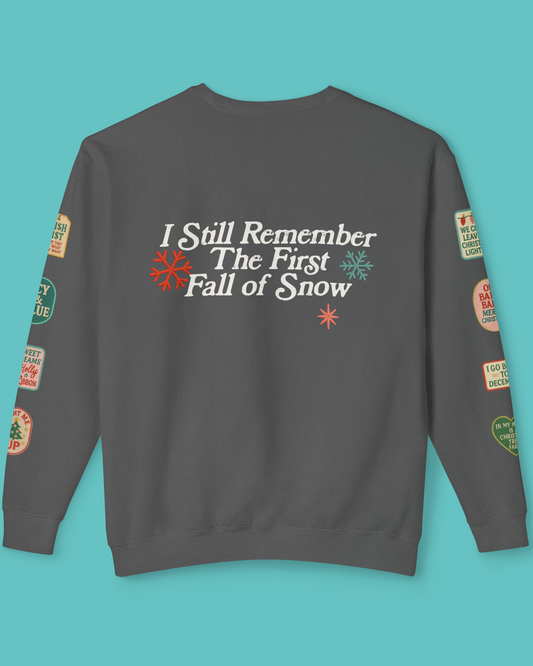 Back of Pepper Gray Comfort Colors Sweatshirt with ski patches on the sleeves